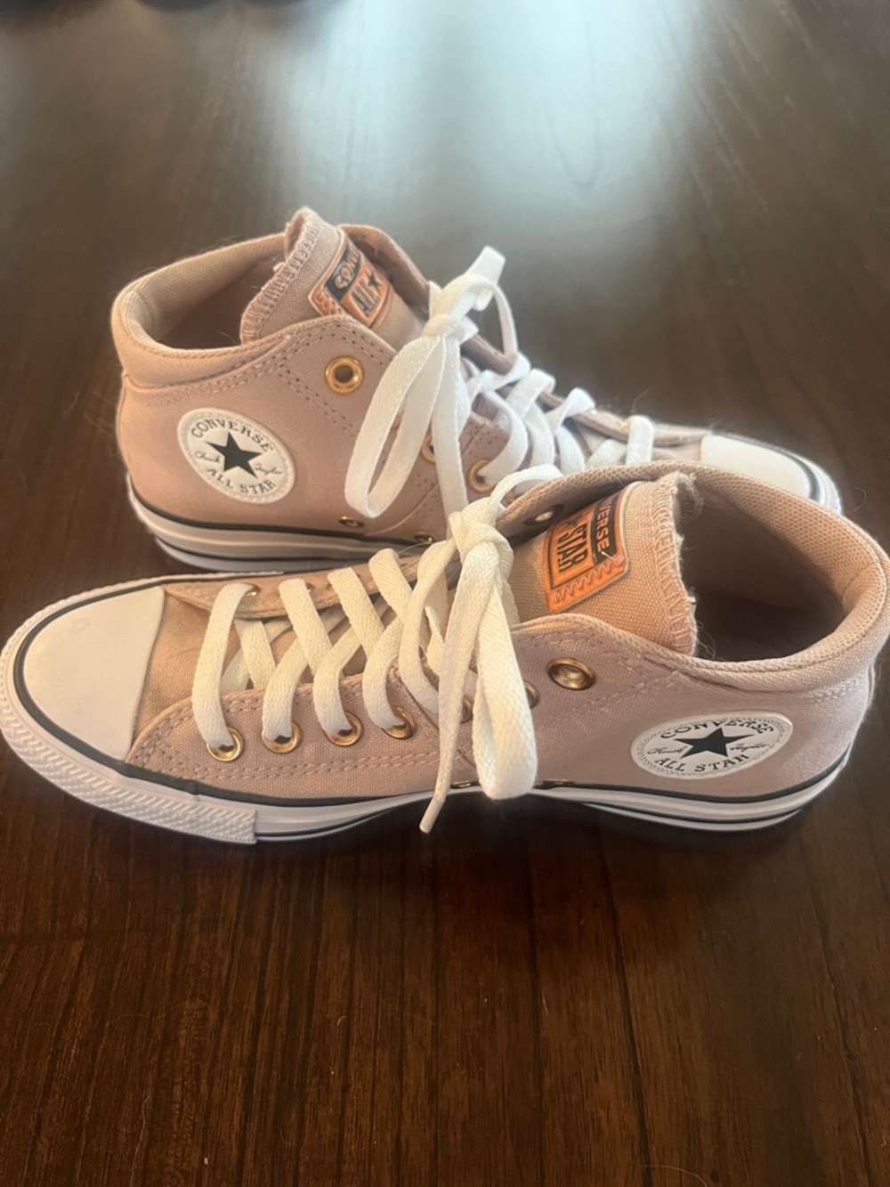 Converse Pink High Top Chuck Taylor Sneakers